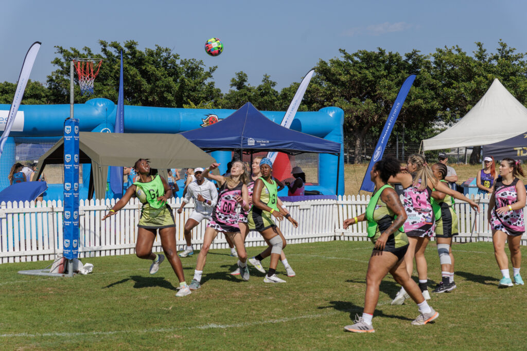 A netball player goes for a ball during a match at the Cape Town 10s 