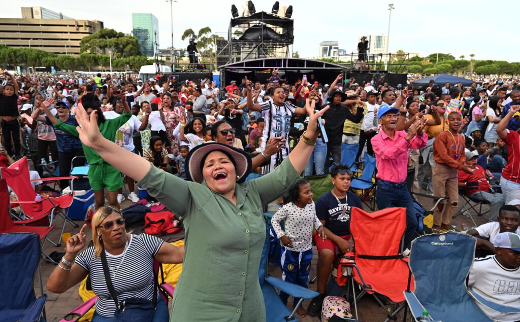 Festive Lights Switch On at the Grand Parade crowd dancing and singing. DJ Zinhle will headline the 2025 event