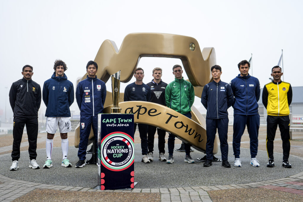 FIH Hockey Nations Cup Captains pose for a photo in front of an installation at the V&A Waterfront