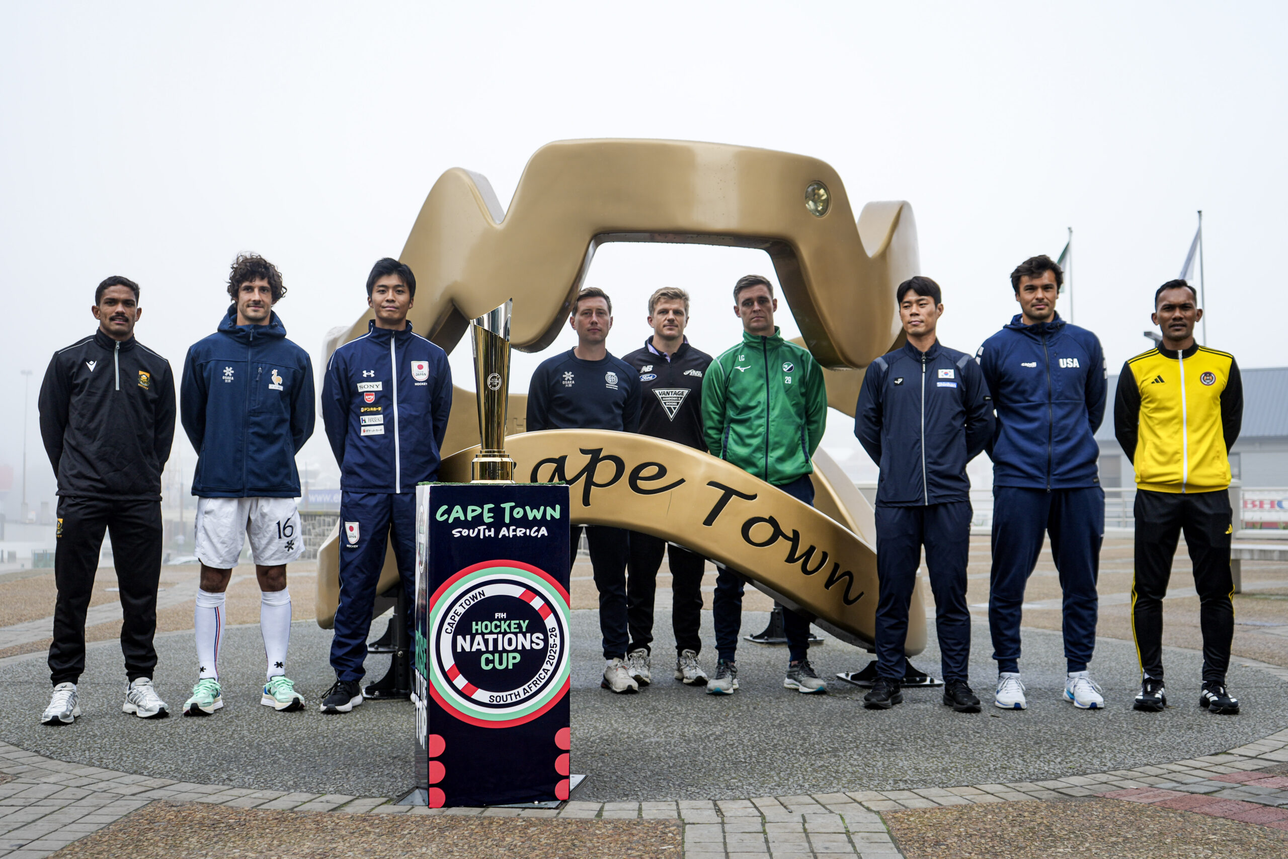 FIH Hockey Nations Cup Captains pose for a photo in front of an installation at the V&A Waterfront