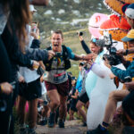 Trail runner passing through UTCT Spectator zone