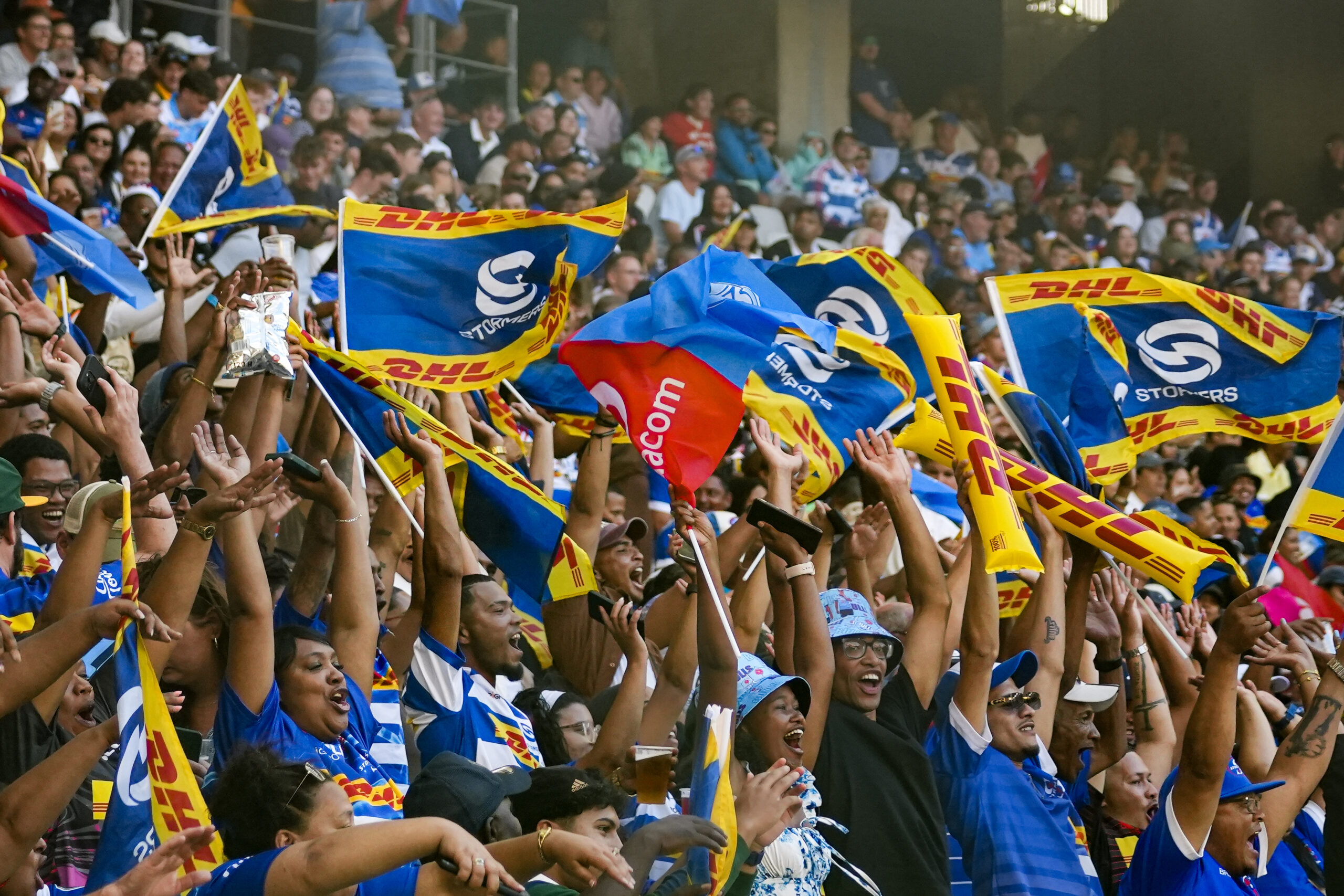 DHL Stormers fans take part in the Mexican wave during a game